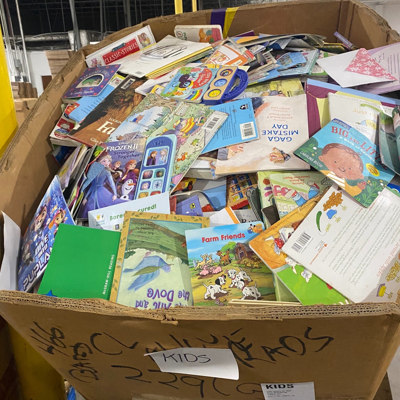 Step 1: books staged on the warehouse floor